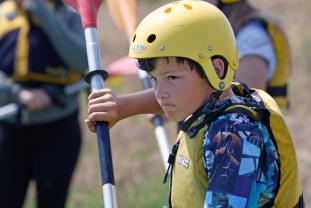 Boy kayaking with JCA