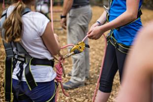 Students preparing for high ropes