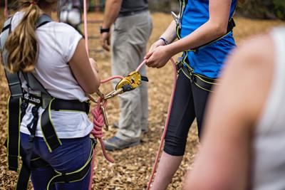 Students doing harness checks