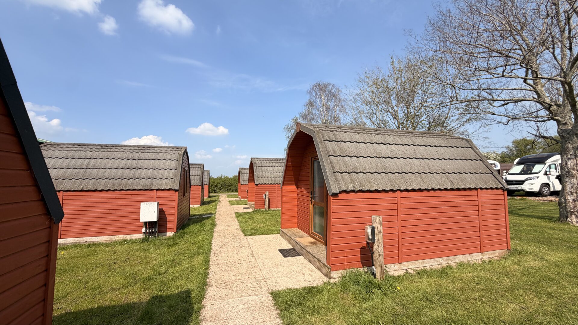 brown-wooden-huts-on-a-blue-sky-day