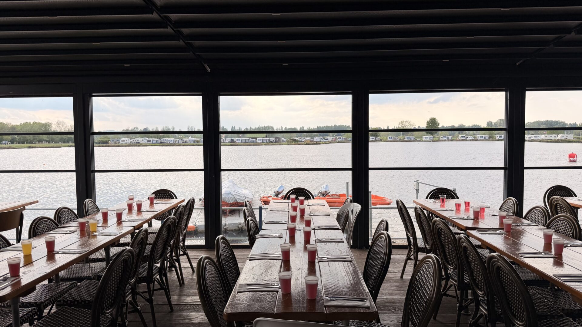 long-dining-tables-over-looking-the-lake-at-croft-farm