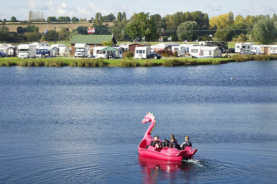 Students on a swan pedalo at Croft Farm's lake