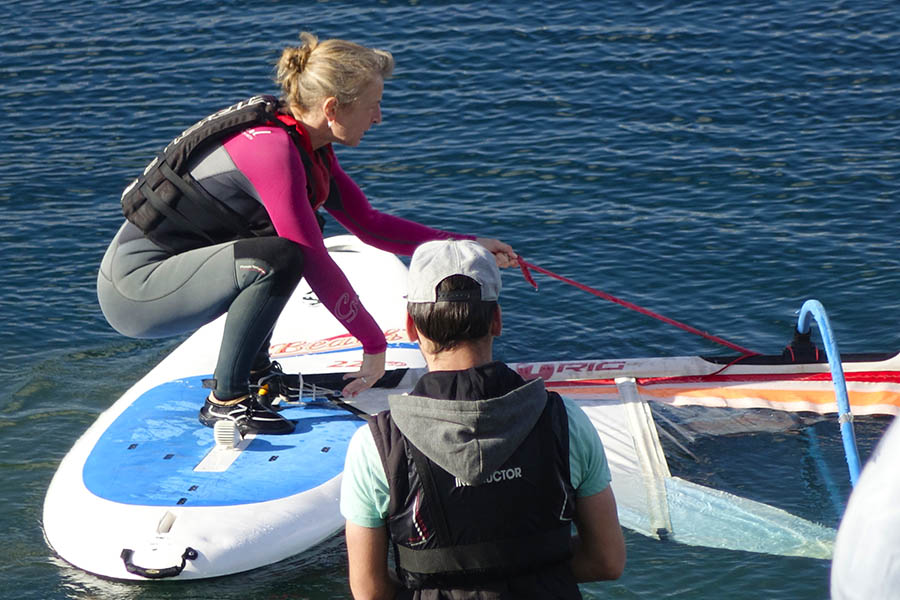 A lady learning to sail at Croft Farm
