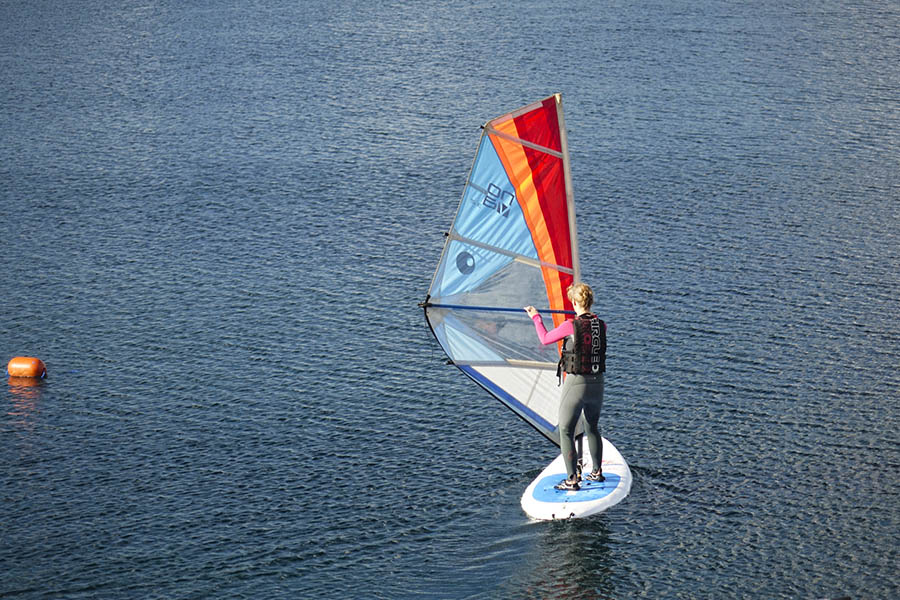 Woman sailing on the lake at Croft Farm