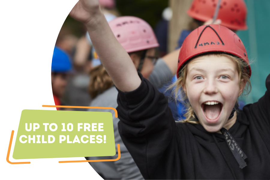 Happy girl raising her arms