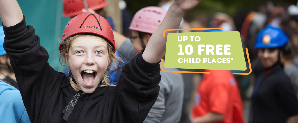 Happy girl raising her arms